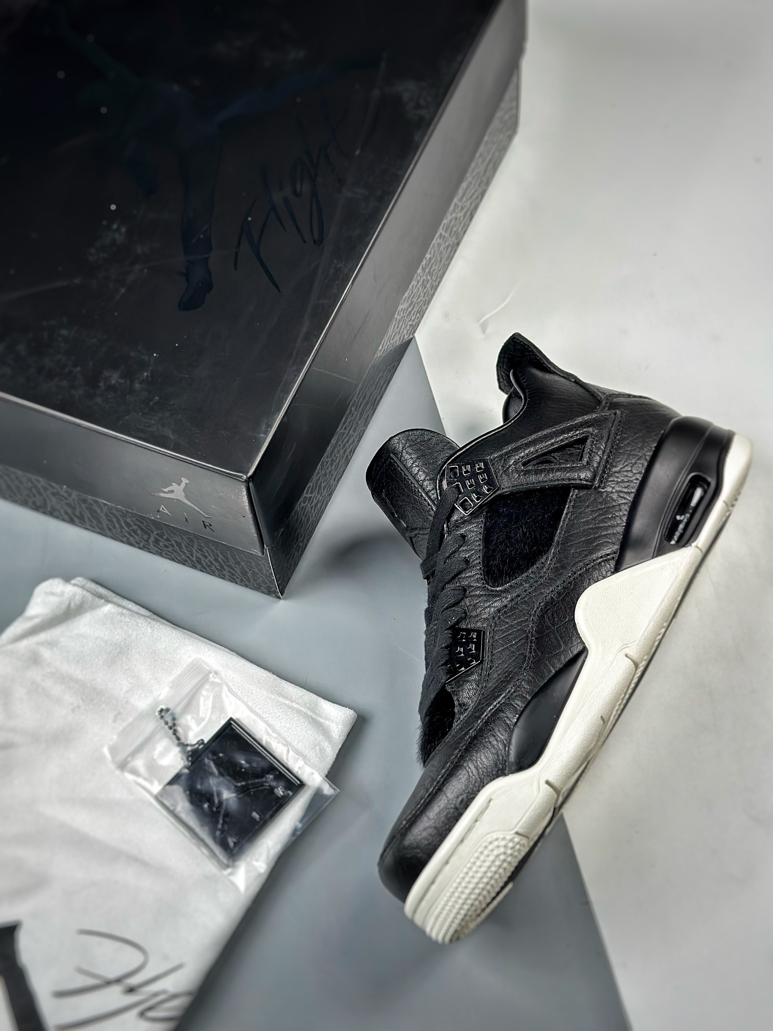 Air Jordan 4 pony hair black